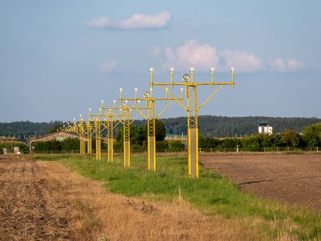 Image of yellow airport signal lights for airplanesの写真素材