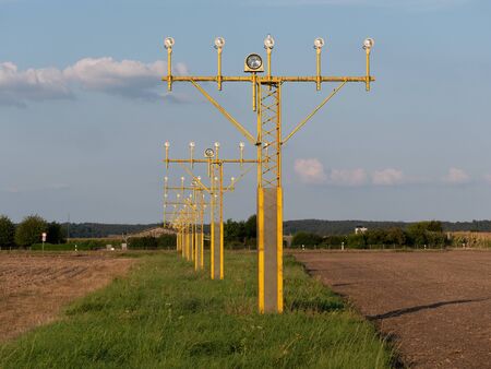 Image of yellow airport signal lights for airplanesの写真素材