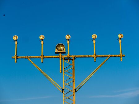 Close-up Image of airport signal lights for airplanes with blue skyの写真素材