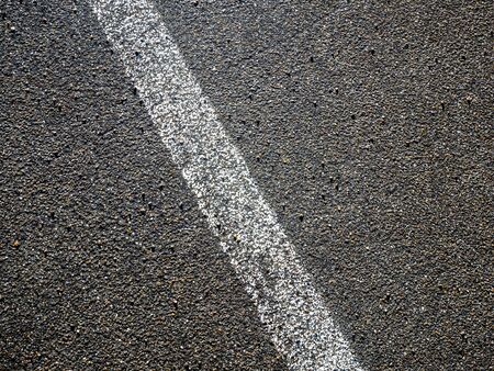 Image of white line on asphalt on streetの写真素材