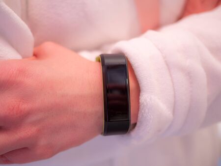 Image of woman wrist with fitness smart watchの写真素材