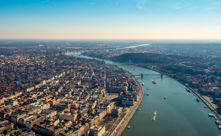 Image of areal view over the Hungarian capital city of Budapest with the river of danube and historical buildings and bridgesの写真素材