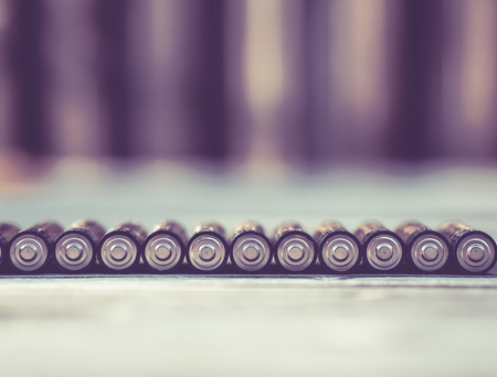 Image of alkaline batteries AA in geometrical orderの写真素材