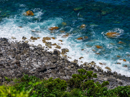Image of sea with rocks along a coast, top down viewの写真素材