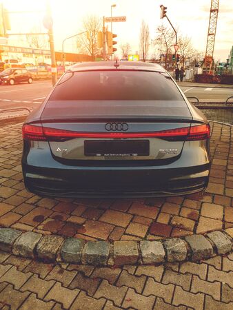 Augsburg, Germany - December 27, 2018: Rear view of black Audi A7 50 TDI Quattro during sunsetのeditorial素材