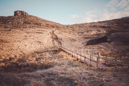 Wooden boardwalk in rural landscape on Madeiraの写真素材