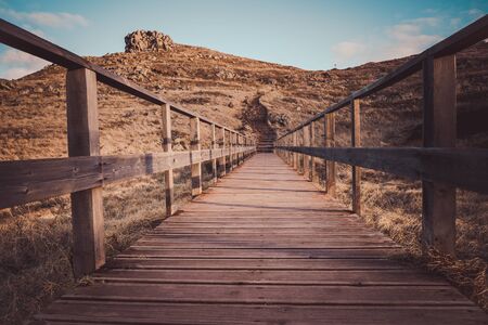 Wooden boardwalk in rural landscape on Madeiraの写真素材