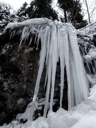 The Breitachklamm ravine in winter time with long icicles in Tiefenbach near Oberstdorf, Bavaria, Germanyの写真素材
