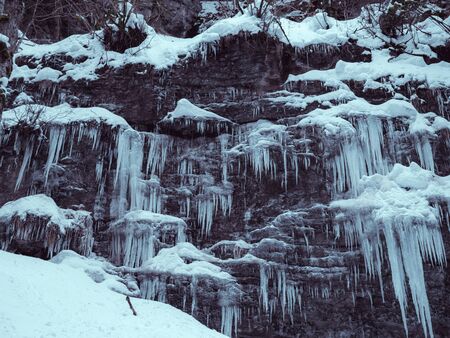 The Breitachklamm ravine in winter time with long icicles in Tiefenbach near Oberstdorf, Bavaria, Germanyの写真素材