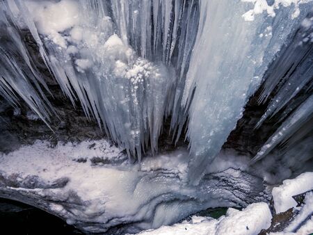 The Breitachklamm ravine in winter time with long icicles in Tiefenbach near Oberstdorf, Bavaria, Germanyの写真素材