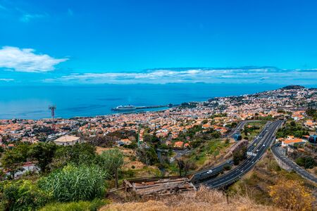 Panoramic view over Funchal the capital of Madeira from a viewpoint, Madeira island, Portugal, Europeの写真素材