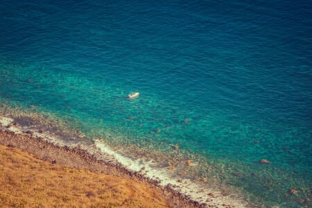 Aerial view, Top Down Drone Shot of beautiful landscape with boat, Madeira, Portugalの写真素材