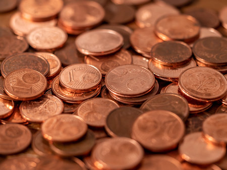 background full of Euro cents, copper coin, one and two cents coin will be dismissed