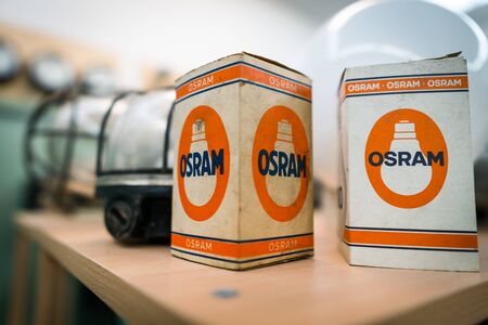 Augsburg, Germany - January 25, 2020: two old Osram boxes on a wooden shelfのeditorial素材