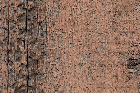 Texture of a wooden surface with an old brown paint on the left. Brown colorの写真素材