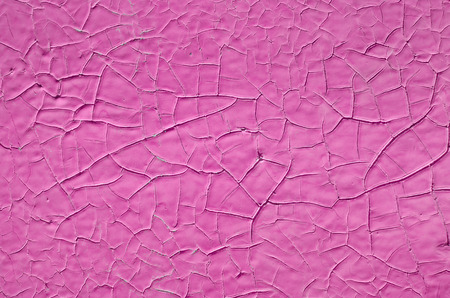 Texture of old paint on metal pink color, background big size, abstractionの写真素材