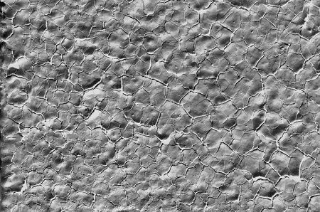 The background dark gray color, the old paint on the stoneの写真素材