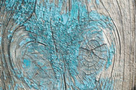 The texture is an old blue paint on the wood. The paint has disappeared, the wood is visibleの写真素材