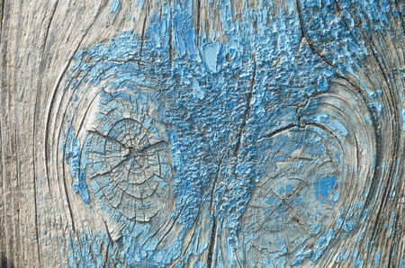 The texture is an old blue paint on the wood. The paint has disappeared, the wood is visibleの写真素材