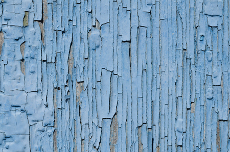 Blue paint peeling on the wood, texture, old paintの写真素材