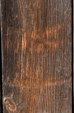 Texture, an outdated wooden board with fading brown spots. Vertical photo, wallpaperの写真素材