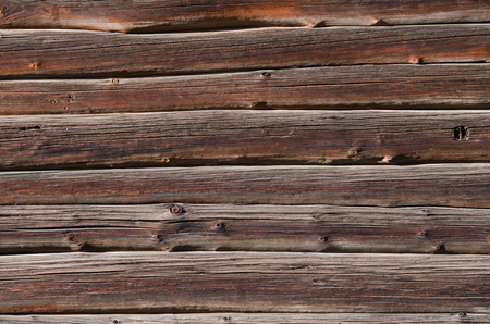 The texture, thin dark wooden planks with light spots, are horizontally arranged. Horizontal photo, wallpaperの写真素材