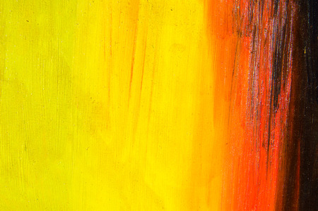 Very beautiful colors on the canvas: yellow, red and a little blackの写真素材