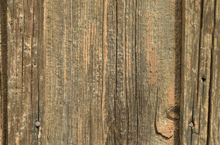 An old wooden board without a paint, a texture. Background, wallpaperの写真素材