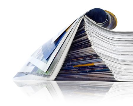 A large stack of magazines piled highの写真素材