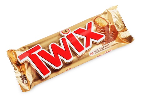 Closeup of Twix candy chocolat bar made by Mars Inc. isolated on white backgroundのeditorial素材
