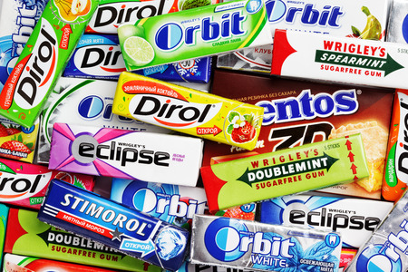Many various colorful chewing or bubble gum including Orbit, Dirol, Eclipse, Stimorol, Wrigley Spearmint and Doublemintのeditorial素材
