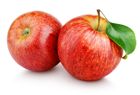Two ripe red apple fruits with green leaf isolated on white background. Red apples with clipping pathの写真素材