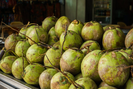 Coconuts displayed at street food stall in George Town, Penang, Malaysia