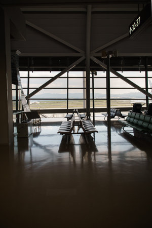 Empty Bench at waiting / departure gate area in the airport