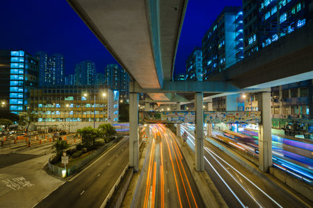 Hong Kong traffic night view with traffic light tracks.