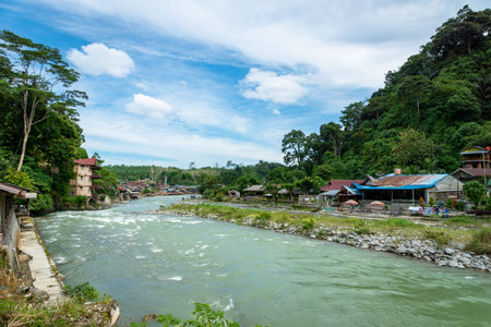 Bukit Lawang, Indonesia - January 2018: Bukit Lawang village and river view. Bukit Lawang is a...