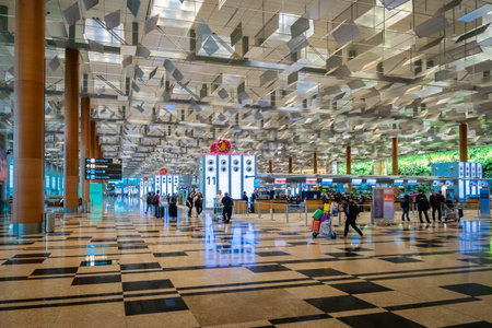 Singapore - January 2019: Singapore Changi Airport architecture and passengers. Singapore. Changi Airport is one of the largest airports in Asia.