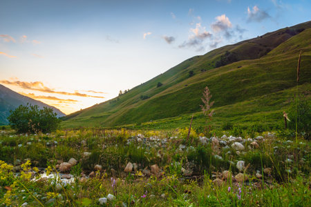 Svaneti landscape at sunset with mountains and river on the trekking and hiking route near Mestia...