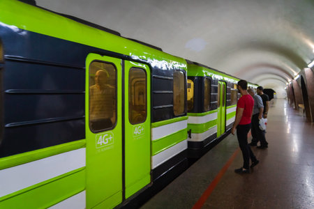 Yerevan, Armenia - July 2019: Yerevan Metro subway train platform and passengers. Yerevan Metro is a...