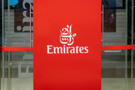 Dubai, UAE - September 2021: Emirates Airlines sign and logo in Dubai Airport, UAE. Emirates is an...