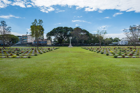 Kanchanaburi, Thailand - December 2021: The Kanchanaburi War Cemetery (known locally as the Don-Rak...