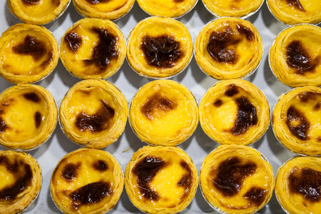 egg tart dessert on display, popular portguese sweets