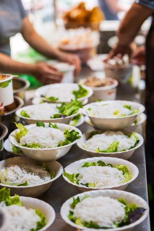 Bum Bo Nam Bo, a traditional Vietnamese noodle dish at street food stall. A popular beef noodle dish...