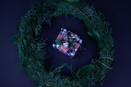 Christmas background with an angel and a giftの写真素材
