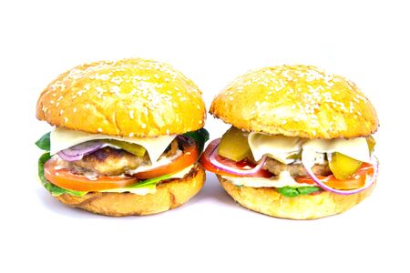 Two hamburgers isolated on a white background front viewsの写真素材