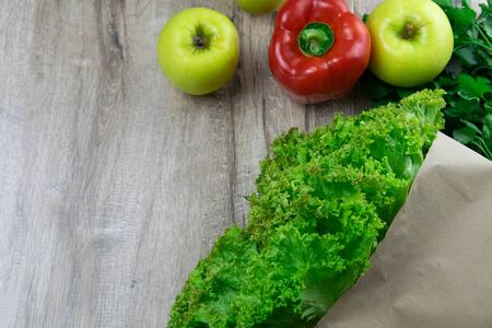Vitamin collection of vegetables sweet green lettuce and red pepper, a green salad onions, greens parsleyの写真素材