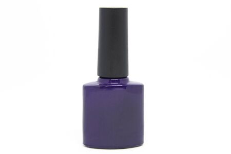 Bottle with violet gel polish isolated on a white background. Front viewの写真素材