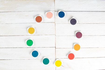 Top view on colorful paints and brushes. Creative ideas, creativity and early learning. Education concept.の写真素材