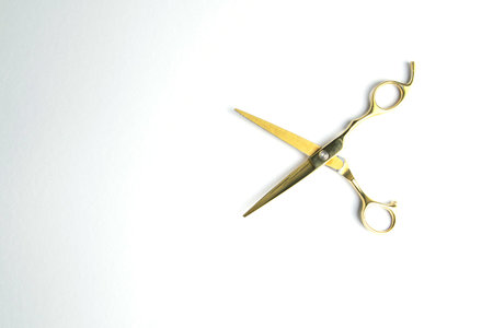 Open scissors for haircut isolated on a white background. Top viewsの写真素材