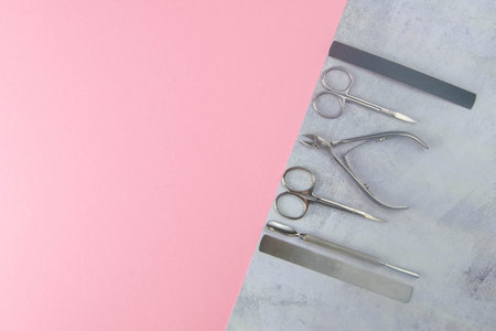 A set of cosmetic tools for manicure and pedicure. Manicure scissors, cuticles, saws, miller stand...